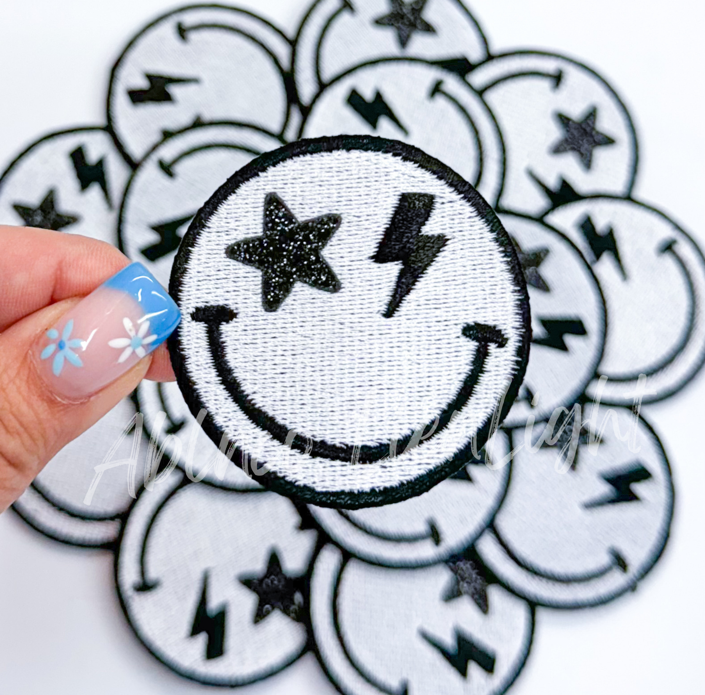 Black star bolt smiley patch
