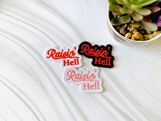 Raisin' hell embroidered patch: White w/red